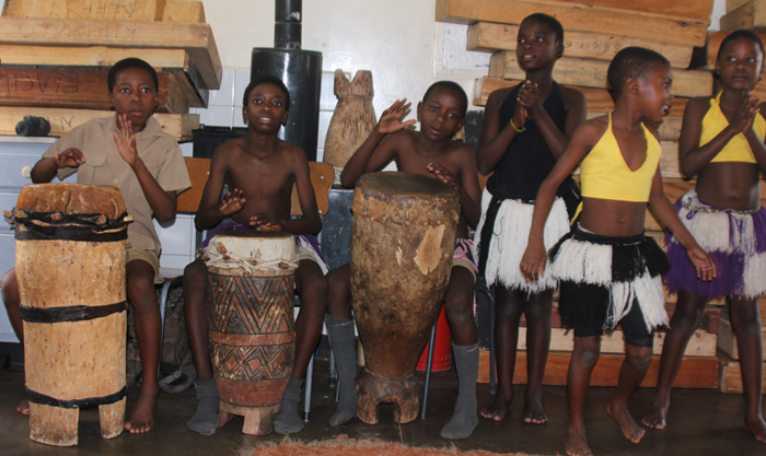 Students play traditional instruments  